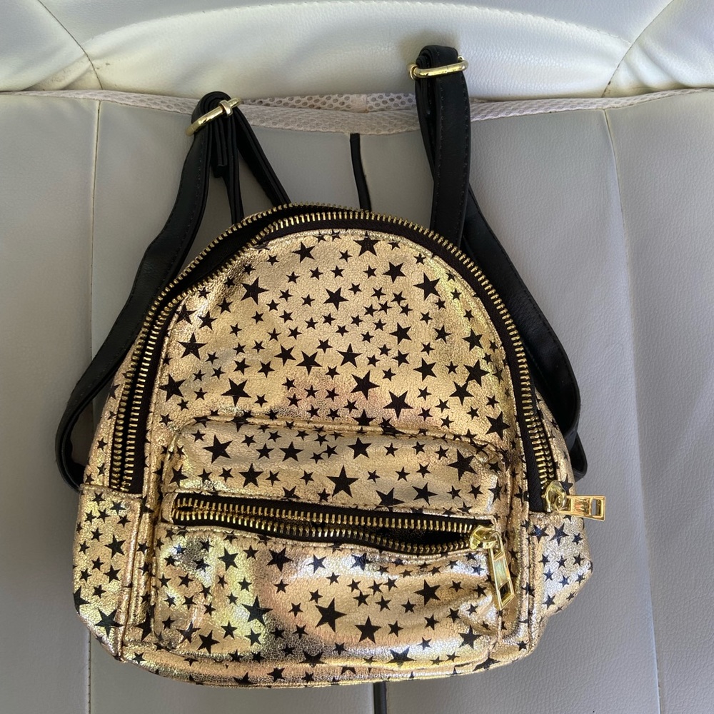 Mossimo mini gold backpack